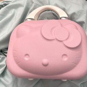 Hello kitty vanity case, can be attached to a luggage handle with strap on back